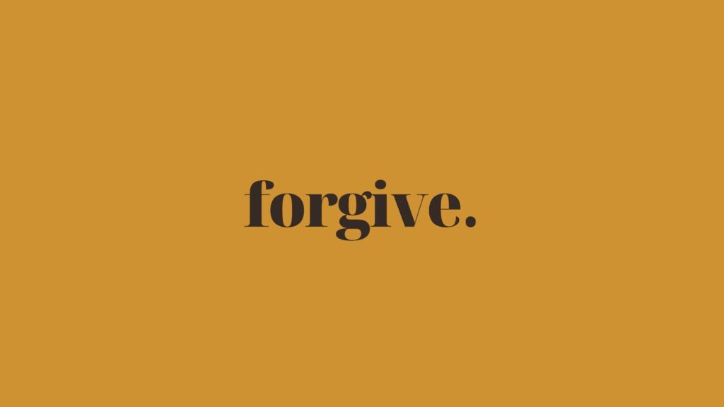 forgive. Brown font on gold background.